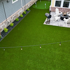 Backyard-Redesign-with-Artificial-Turf-Putting-Green-Landscape-Rock-Installation-in-McKinney-TX 13